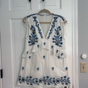 White Sleeveless Embroidered V-Neck Tunic with Blue Floral Accents